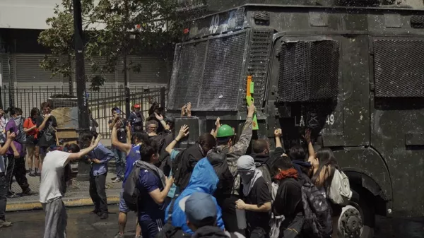El grito de auxilio en Chile ante el abuso de las autoridades en el estallido social El grito de auxilio en Chile ante el abuso de las autoridades en el estallido social - Sputnik Mundo