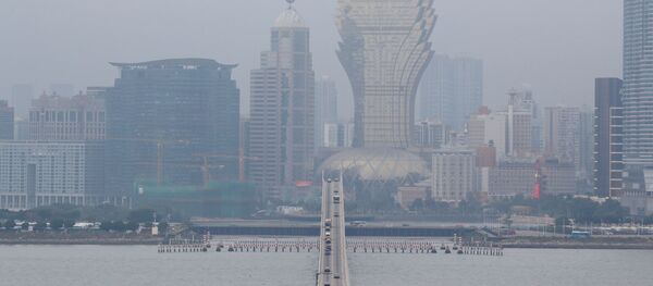 El smog en la ciudad de Macao, China (imagen referencial) - Sputnik Mundo