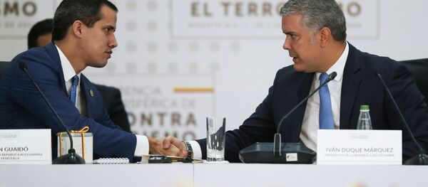 El opositor venezolano, Juan Guaidó, y el presidente de Colombia, Iván Duque - Sputnik Mundo