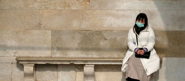 Una turista china - Sputnik Mundo