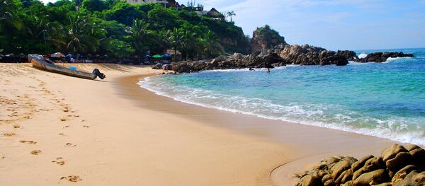 Una playa (imagen referencial) - Sputnik Mundo
