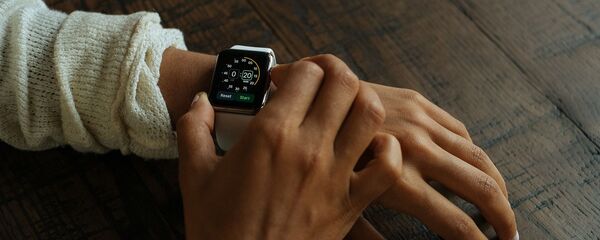 Un reloj inteligente (imagen referencial) - Sputnik Mundo