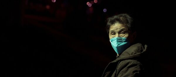 Un chino en la mascarilla - Sputnik Mundo