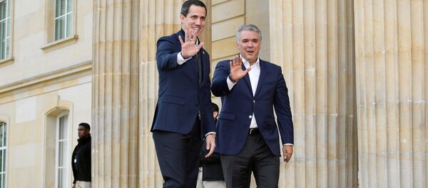 El líder opositor venezolano, Juan Guaidó con el presidente de Colombia, Iván Duque - Sputnik Mundo