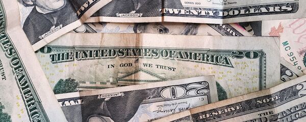Dólares estadounidenses (imagen referencial) - Sputnik Mundo
