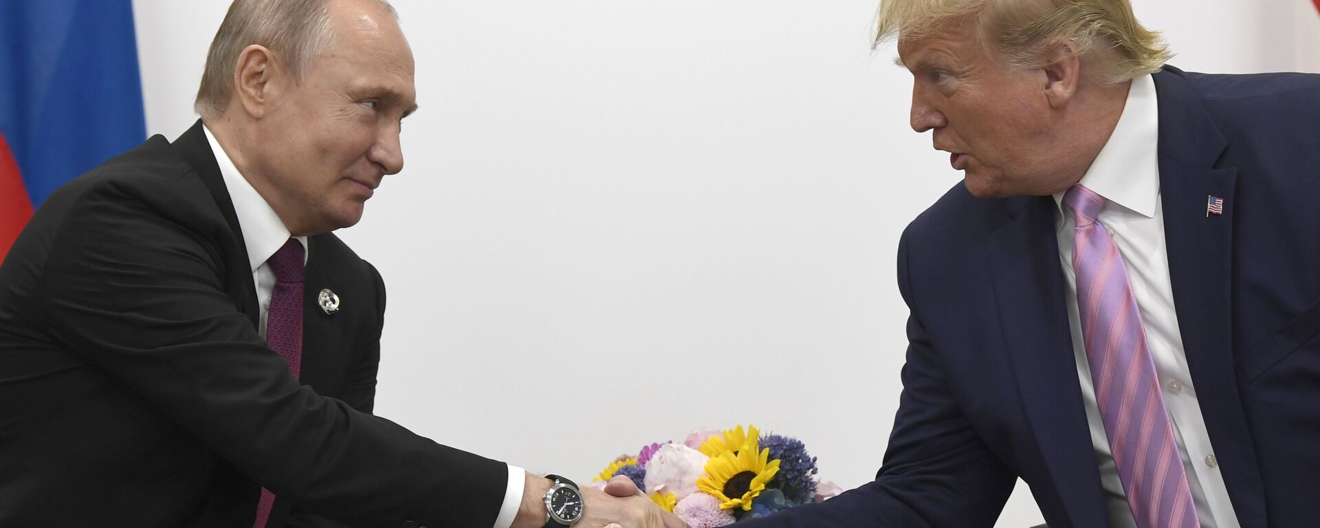 El presidente de Rusia, Vladímir Putin junto a su homólogo de EEUU, Donald Trump - Sputnik Mundo, 1920, 11.08.2025