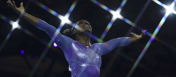 Simone Biles, gimnasta estadounidense - Sputnik Mundo