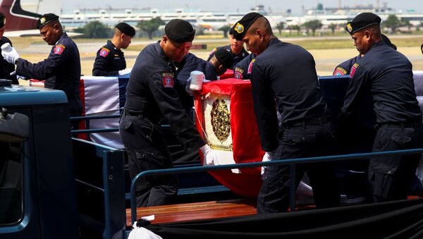 Funerales de las víctimas del tiroteo en Tailandia - Sputnik Mundo