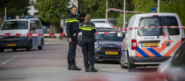 Dos agentes de Policía en Ámsterdam - Sputnik Mundo