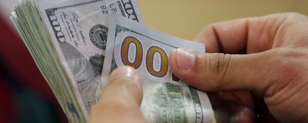 Dólares estadounidenses (imagen referencial) - Sputnik Mundo