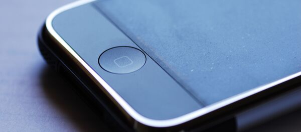 Un botón de un iPhone Un botón de un iPhone - Sputnik Mundo