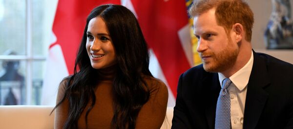 Meghan Markle y su exposo, el prínicpe Harry - Sputnik Mundo