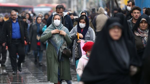 Dos mujeres iraníes con tapabocas Dos mujeres iraníes con tapabocas - Sputnik Mundo