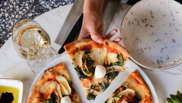 Pizza, imagen referencial - Sputnik Mundo