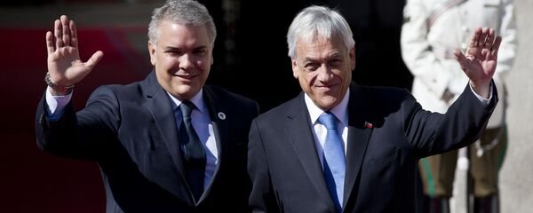 El presidente de Colombia, Iván Duque, y su homólogo chileno, Sebastián Piñera - Sputnik Mundo