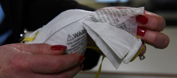 Una mascarilla - Sputnik Mundo