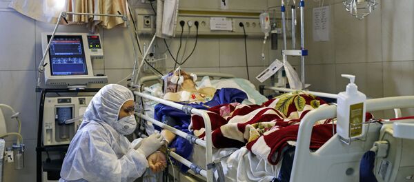 Un paciente con coronavirus en un hospital (imagen referencial) - Sputnik Mundo