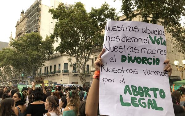 Un cartel durante la marcha de mujeres del 9 de marzo en Buenos Aires, Argentina - Sputnik Mundo