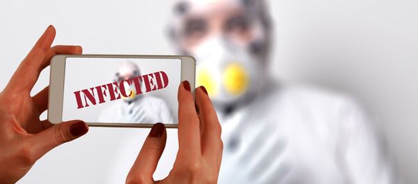 Teléfono móvil infectado por el coronavirus - Sputnik Mundo