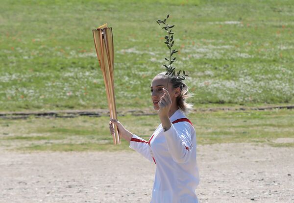 Encienden la llama de Tokio 2020 a puertas cerradas y en medio de la creciente incertidumbre | Fotos - Sputnik Mundo