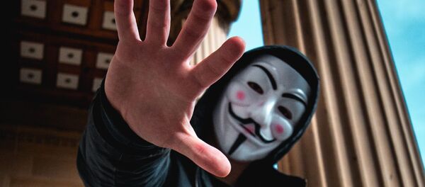 Hombre en la máscara (imagen referencial) - Sputnik Mundo