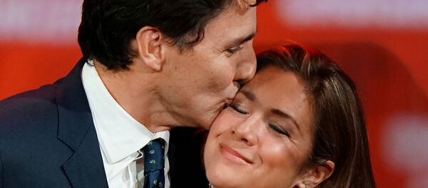 El primer ministro de Canadá, Justin Trudeau y su esposa, Sophie Gregoire El primer ministro de Canadá, Justin Trudeau y su esposa, Sophie Gregoire - Sputnik Mundo