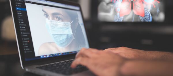 Coronavirus - trabajo remoto - Sputnik Mundo