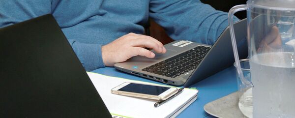 Teletrabajo (imagen referencial) - Sputnik Mundo