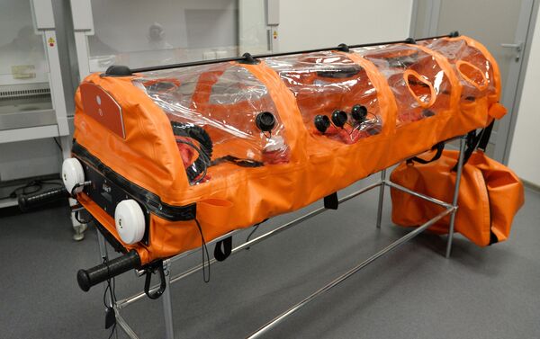 Una cápsula hermética para personas contagiadas del COVID-19 - Sputnik Mundo