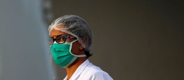 Una médico en Brasilia, Brasil - Sputnik Mundo