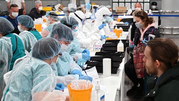 Control sanitario en un aeropuerto en Moscú Control sanitario en un aeropuerto en Moscú - Sputnik Mundo