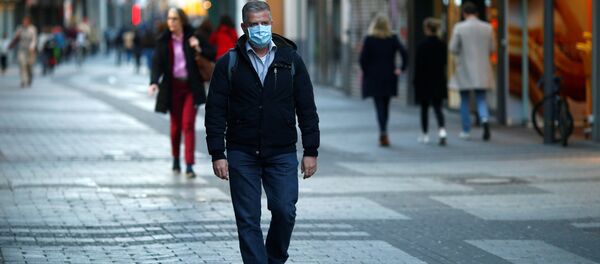 Un hombre en mascarilla (imagen referencial)  - Sputnik Mundo