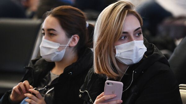 Mujeres en mascarillas (imagen referencial) - Sputnik Mundo