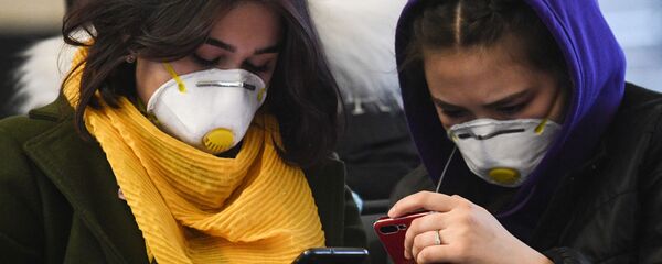 Mujeres en mascarillas (imagen referencial) Mujeres en mascarillas (imagen referencial) - Sputnik Mundo