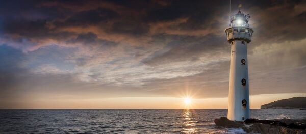 Un faro en una isla. Imagen referencial - Sputnik Mundo