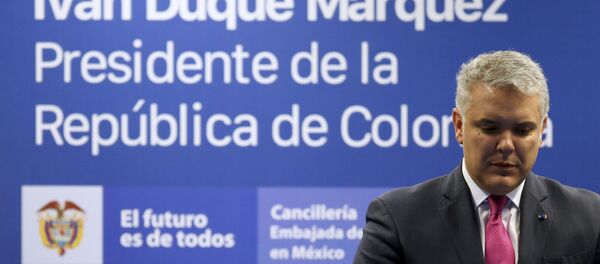 El presidente de Colombia Iván Duque durante una conferencia de prensa - Sputnik Mundo