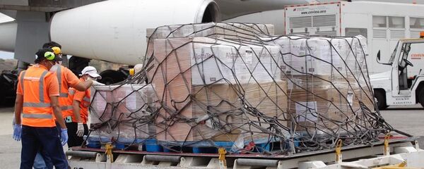 La llegada de la ayuda humanitaria de República Popular China para combatir el virus COVID-19 - Sputnik Mundo