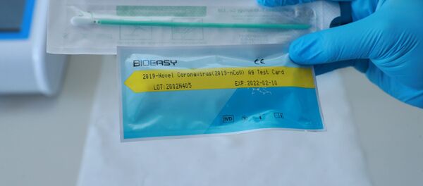 Prueba de descarte del nuevo coronavirus - Sputnik Mundo