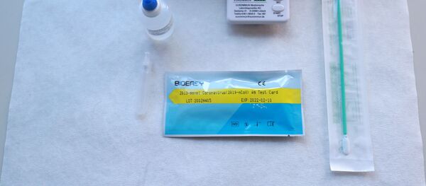 Prueba de descarte del nuevo coronavirus - Sputnik Mundo