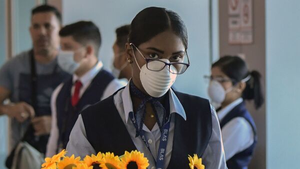 Mujer con tapabocas en Panamá (referencial) Mujer con tapabocas en Panamá (referencial) - Sputnik Mundo