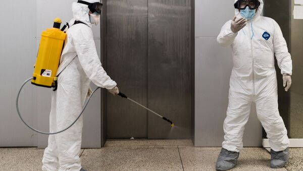 Operativo de desinfección en un hospital de Caracas, Venezuela Operativo de desinfección en un hospital de Caracas, Venezuela - Sputnik Mundo