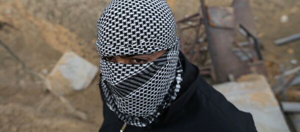 Un militante palestino - Sputnik Mundo