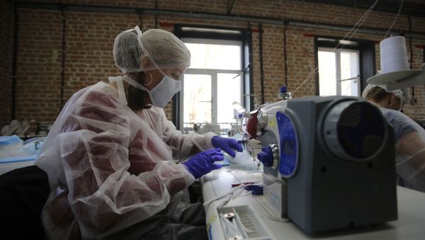 Producción de mascarillas Producción de mascarillas - Sputnik Mundo