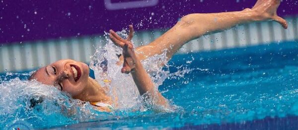 Alisa Ozhogina en competición - Sputnik Mundo