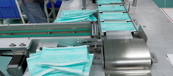 Fábrica de mascarillas (imagen referencial) Fábrica de mascarillas (imagen referencial) - Sputnik Mundo