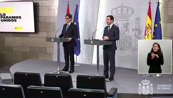 Rueda de prensa telemática desde La Moncloa del ministro de Sanidad, Salvador Illa, y del ministro de Consumo, Alberto Garzón Rueda de prensa telemática desde La Moncloa del ministro de Sanidad, Salvador Illa, y del ministro de Consumo, Alberto Garzón - Sputnik Mundo