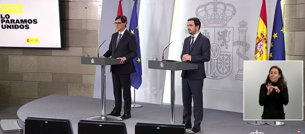 Rueda de prensa telemática desde La Moncloa del ministro de Sanidad, Salvador Illa, y del ministro de Consumo, Alberto Garzón Rueda de prensa telemática desde La Moncloa del ministro de Sanidad, Salvador Illa, y del ministro de Consumo, Alberto Garzón - Sputnik Mundo