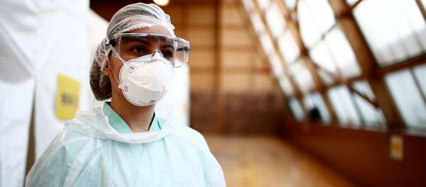 Una médica (imagen referencial) - Sputnik Mundo