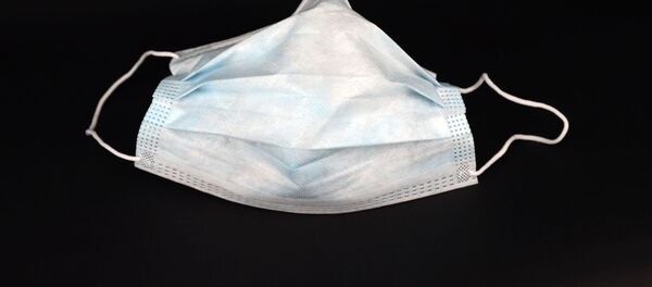 Una mascarilla - Sputnik Mundo