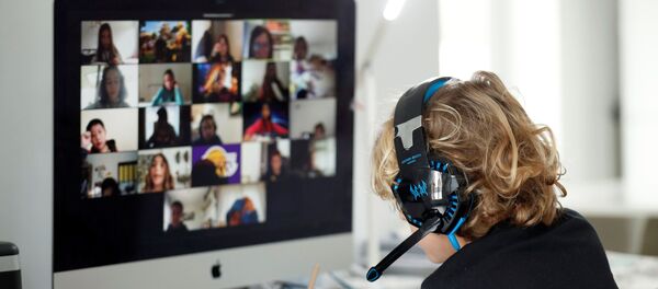 Una clase en la aplicación Zoom - Sputnik Mundo